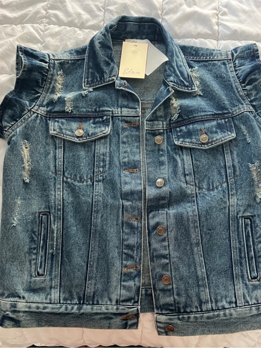 Distressed Washed Blue Denim Ruffle Sleeve Vest.